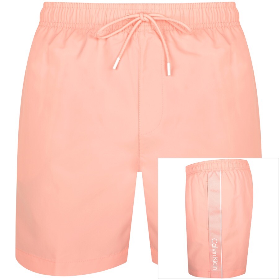 Shop Calvin Klein Logo Swim Shorts Pink